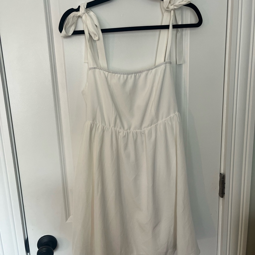 Women’s white dress with tie bow straps